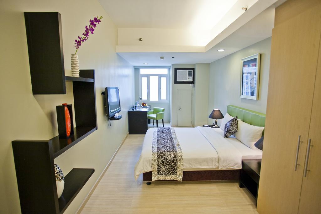 The Exchange Regency Residence Hotel Managed By Hii Pasig City Exterior photo
