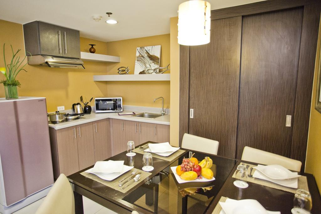 The Exchange Regency Residence Hotel Managed By Hii Pasig City Room photo
