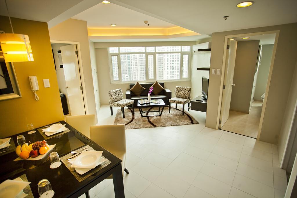 The Exchange Regency Residence Hotel Managed By Hii Pasig City Room photo