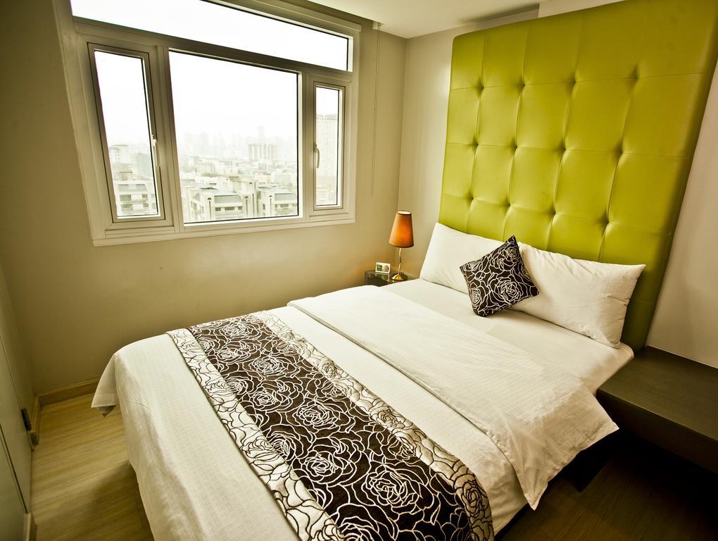 The Exchange Regency Residence Hotel Managed By Hii Pasig City Room photo