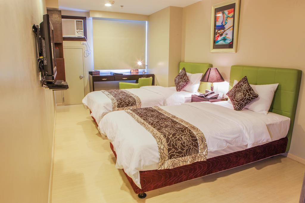The Exchange Regency Residence Hotel Managed By Hii Pasig City Exterior photo